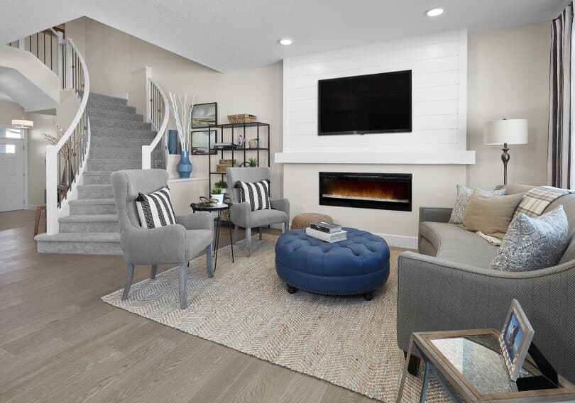 Living area with fireplace in Robson at Paisley in Edmonton, AB by Brookfield Residential