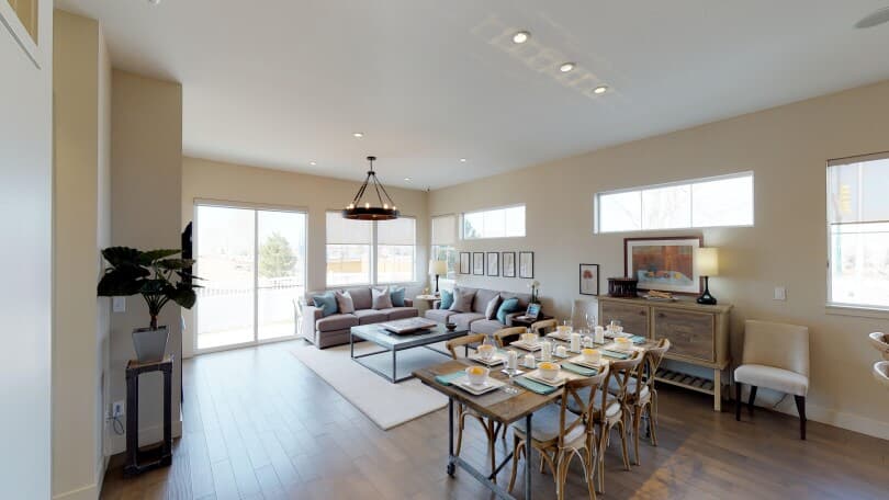Interior view of dining area and living room in the Freestyle 4 floor plan at Brighton Crossings, Colorado