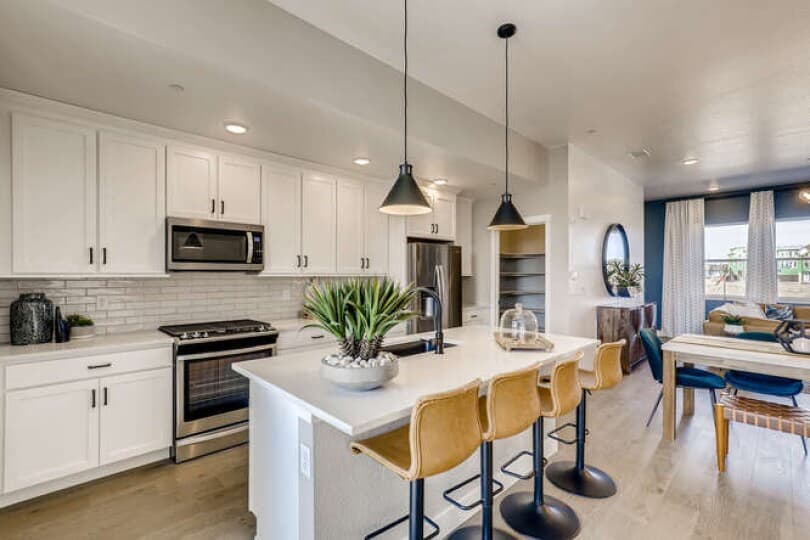 Bright white kitchen in the Cadence Townhomes at Midtown in Denver, CO by Brookfield Residential
