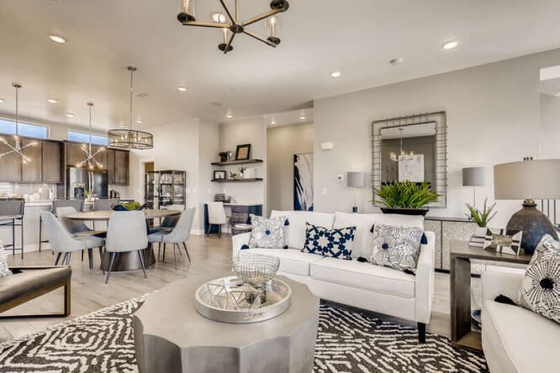 Stylish living room in the Cadence Townhomes at Midtown in Denver, CO by Brookfield Residential