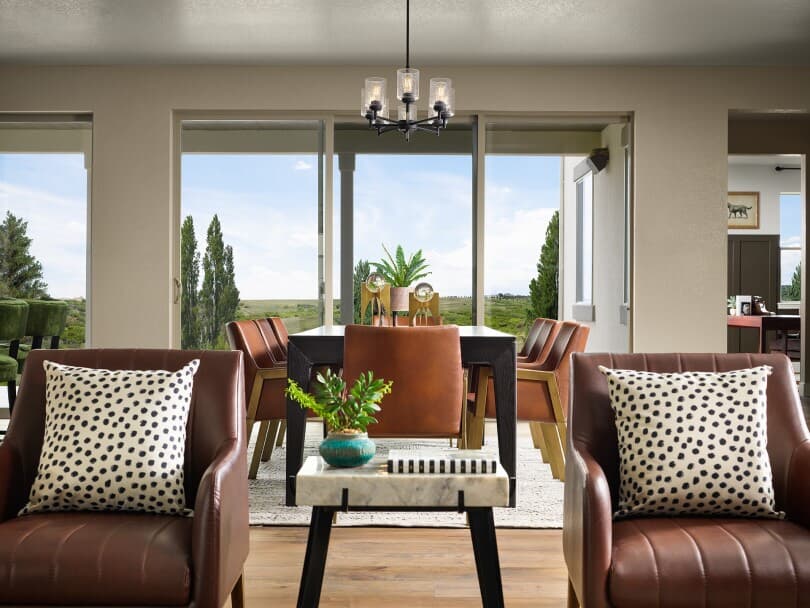Dining room that leads to outdoor space in the Plan 8 in the Harvest Portfolio at Solterra in Lakewood, CO