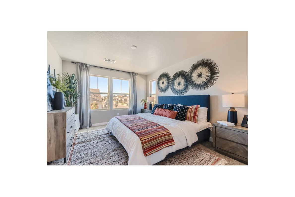 Primary bedroom in the Essence Portfolio at Brighton Crossings by Brookfield Residential in Denver CO