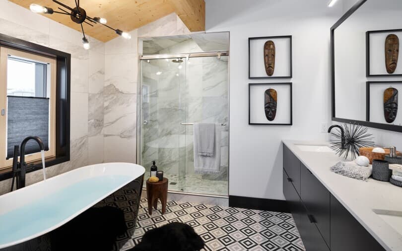 Black and white flooring in the ensuite of Passive Haus at Symons Gate in Calgary, AB