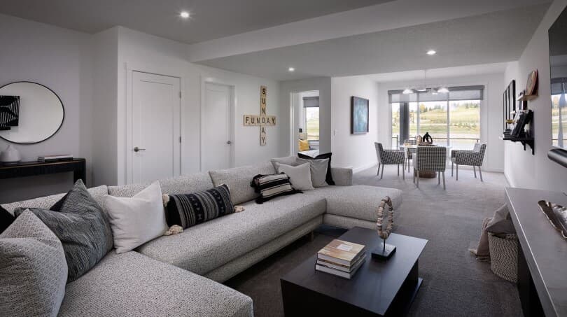Basement living area in Columbia at Rockland Park by Brookfield Residential in Calgary, AB