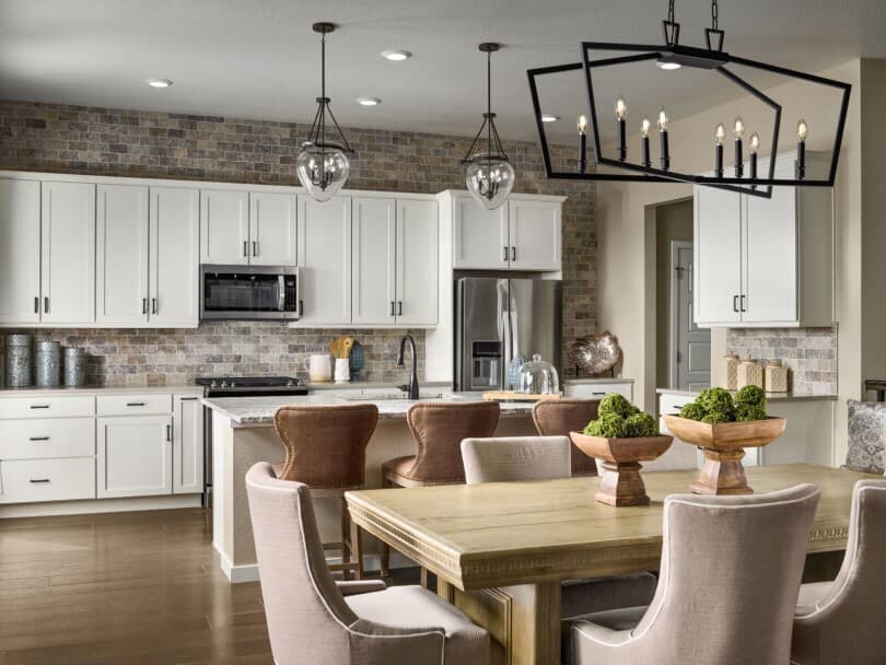 Kitchen and dining area in Ovation 2 at Barefoot Lakes in Denver, CO