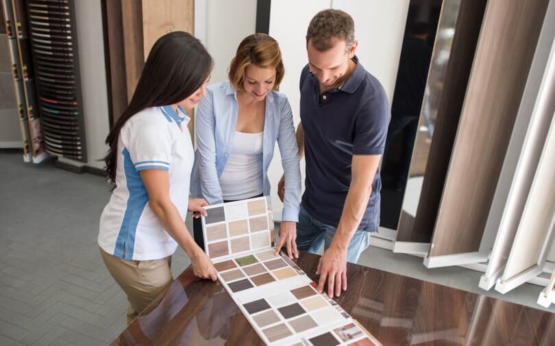 A couple picking finishes with a Brookfield Residential Designer