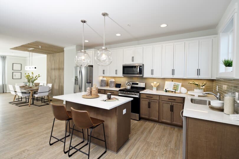 Kitchen with island in the Glendale plan at Dowden's Station in Clarksburg, MD