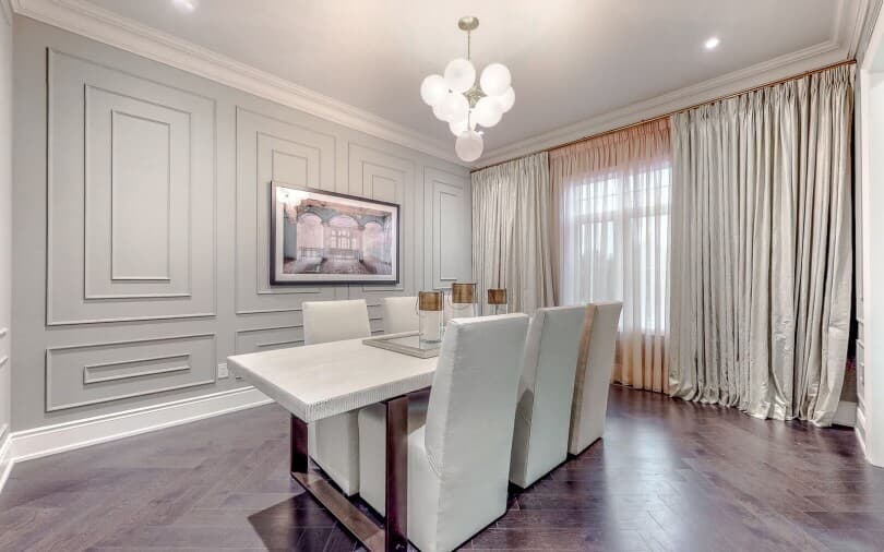 Dining room with wood moulding in Amethyst at Woodhaven in Aurora, ON