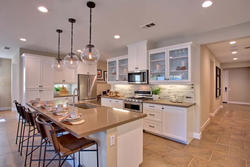 White kitchen in the Residence 1 at Agave at Spencer's Crossing in Murrieta, CA by Brookfield Residential